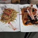 Brezza Marina & Ristorante Shoreline 4* 포쟐로
